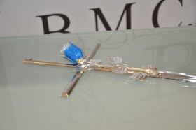 croce nickel rosa blu dettaglio